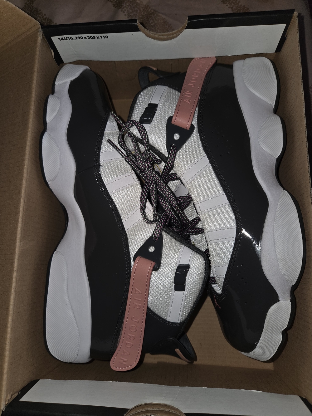 Jordan Women’s Black and White Sneakers with Pink Tabs